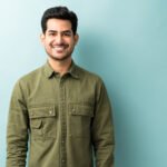 happy man standing against isolated background